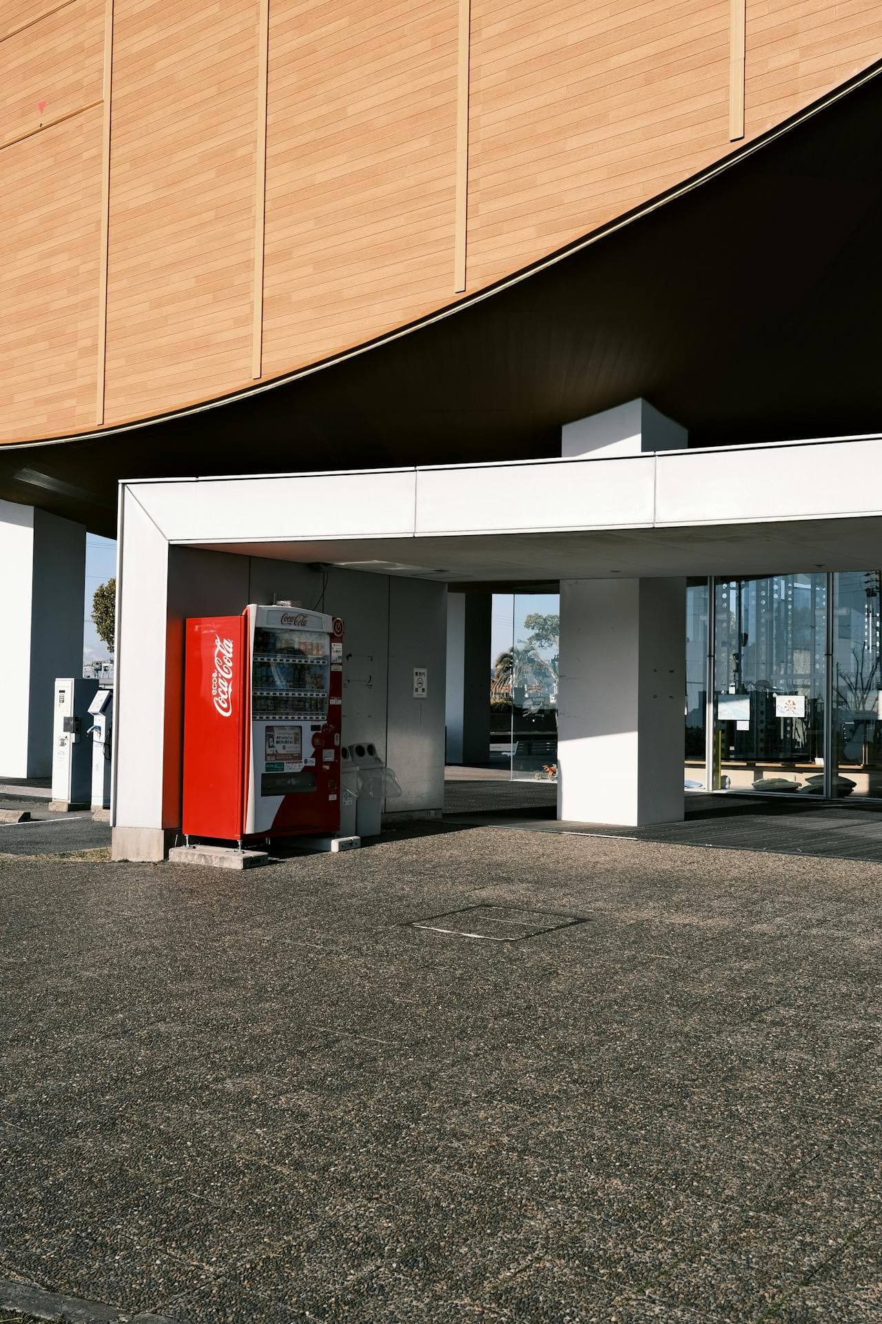 Modern vending machine outside a contemporary building